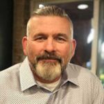 Chris Shurian discussing resilience and overcoming adversity on the Give A Heck Podcast